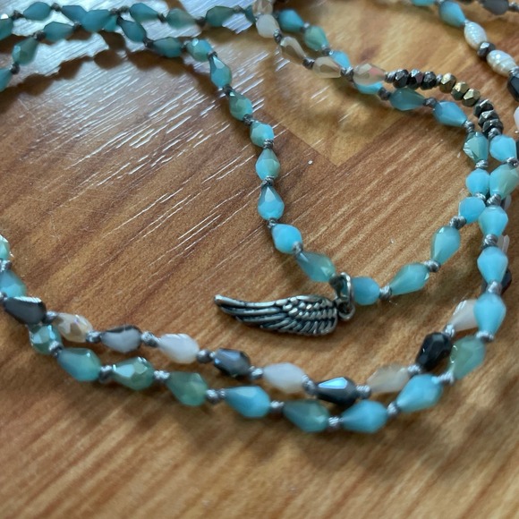 Alexa's Angel's wing‎ String - Picture 2 of 4